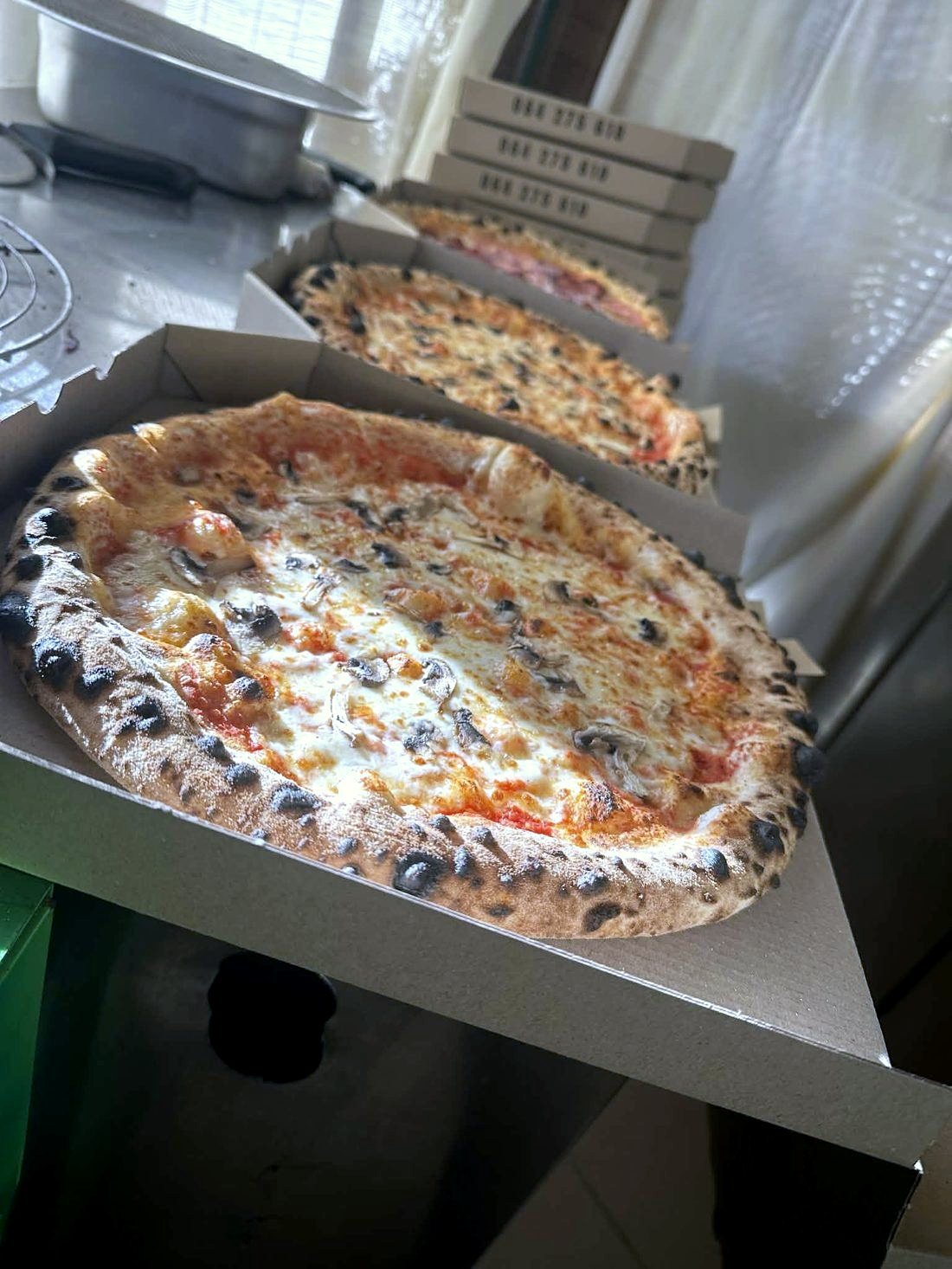Pizze v škatlah